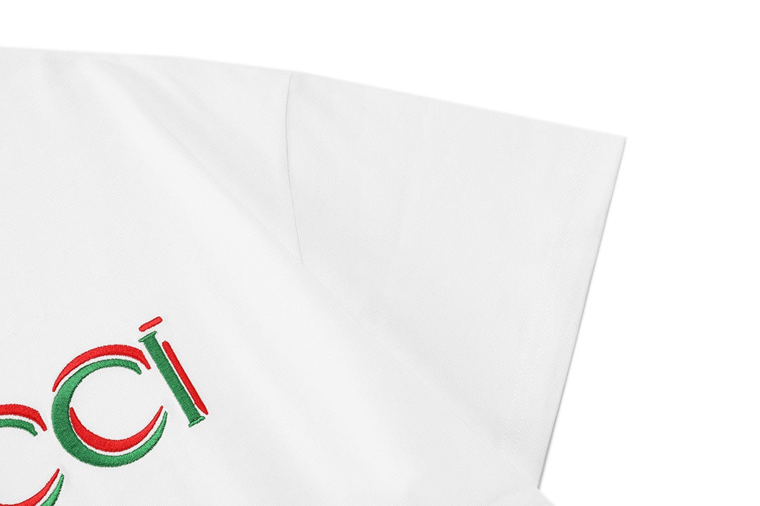 White T-shirt sleeve with partial Gucci logo embroidery