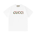 White short-sleeve T-shirt with Gucci logo print at center front