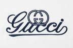 Gucci T-shirt chest logo in blue thread on white fabric