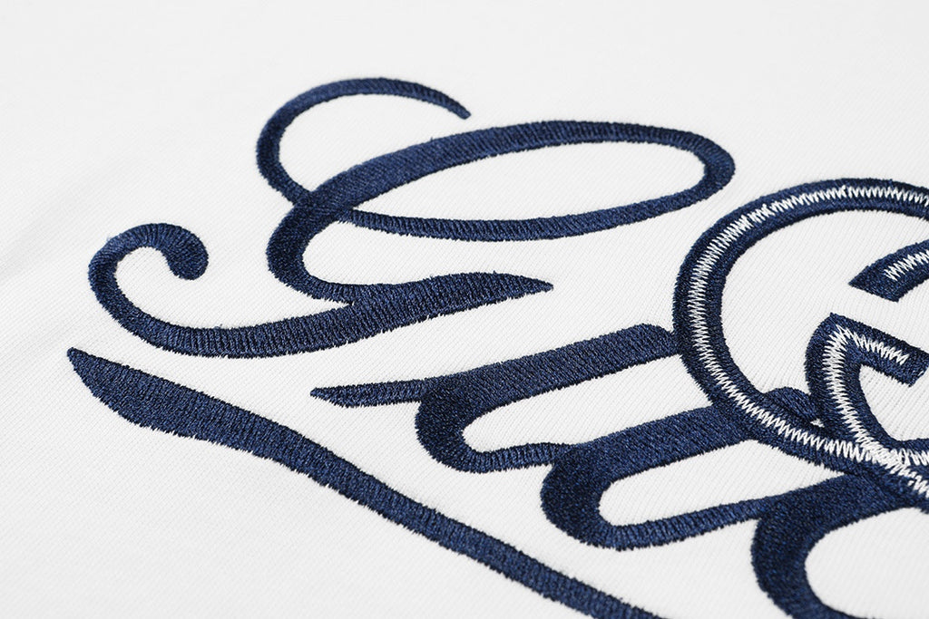 Gucci T-shirt logo close-up in blue on white front