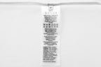 Gucci short care label on white fabric tag
