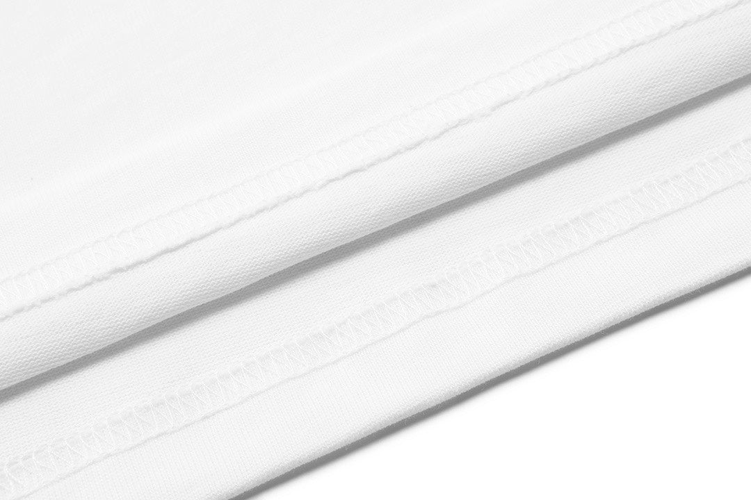 Gucci T-shirt hem with stitched edge on white fabric