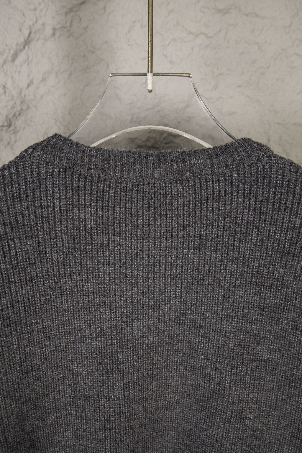 Dark gray knit sweater back yoke and neckline