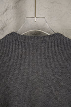 Dark gray knit sweater back yoke and neckline