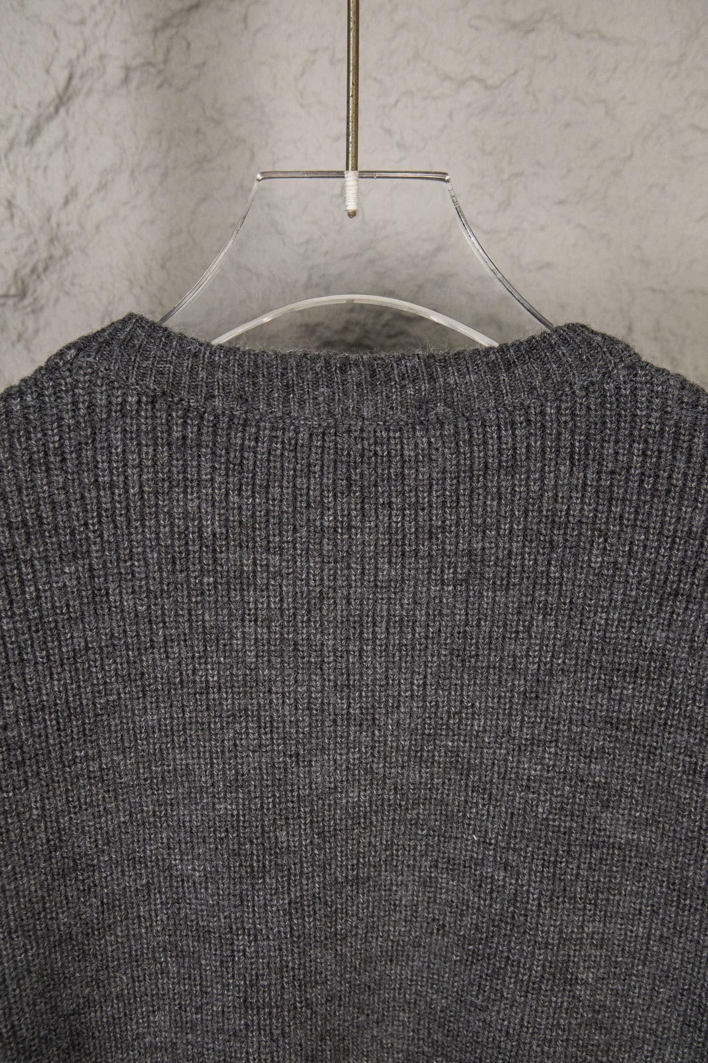 Dark gray knit sweater back yoke and neckline