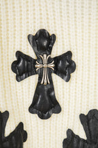 Off-white knit sweater with large central black clover cross applique