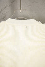 Off-white knit sweater back view with ribbed knit and fringe hem