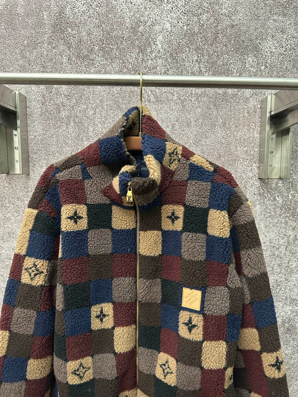 Long-sleeve check sherpa jacket with stand collar, front zipper, and patterned hood