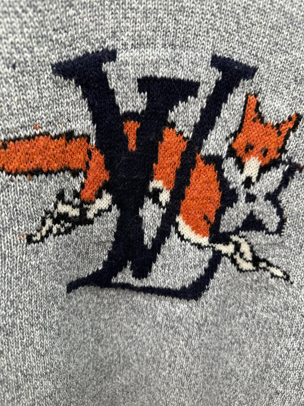 Louis Vuitton logo graphic knit on light blue sweater