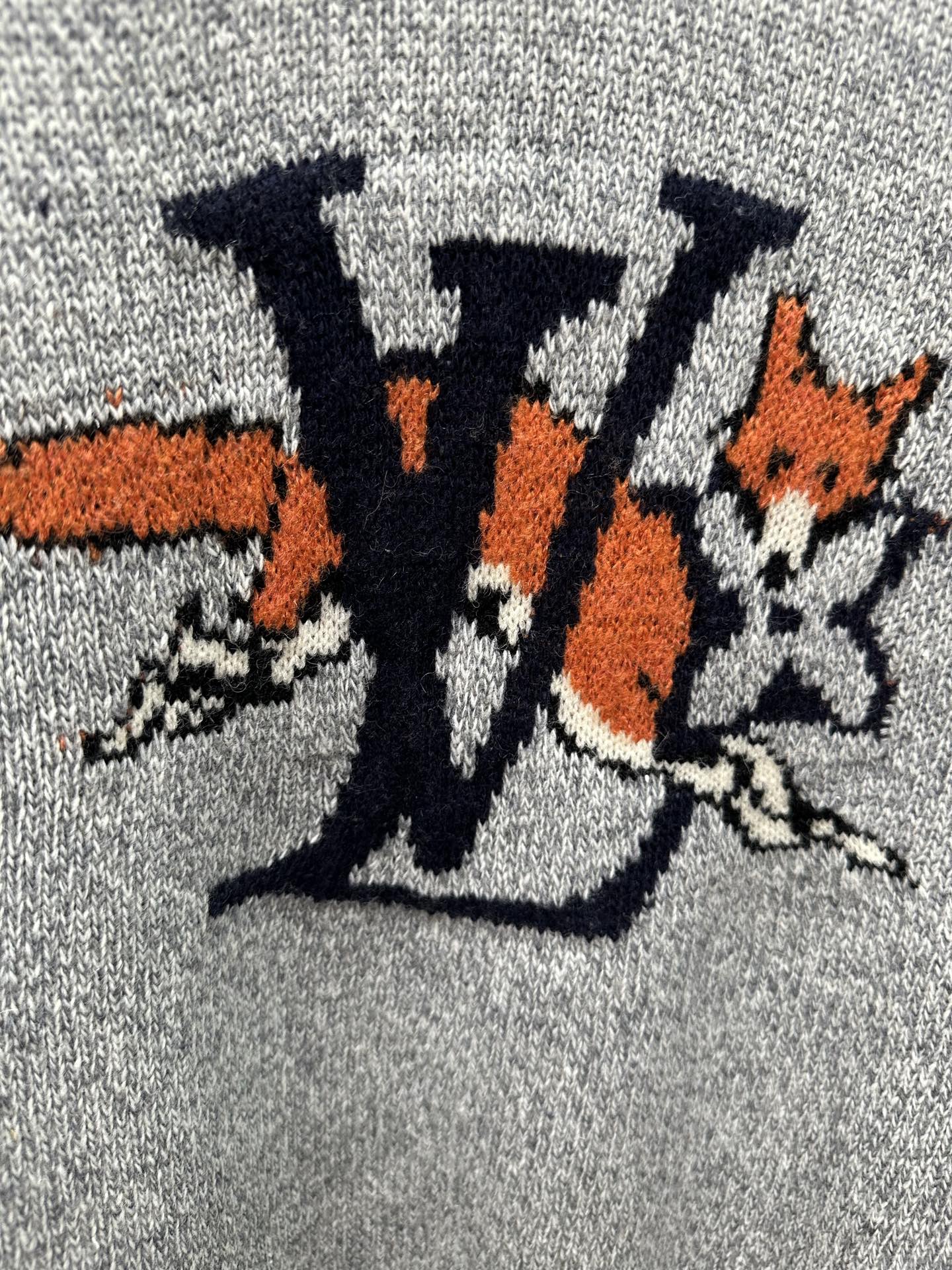 Louis Vuitton logo graphic knit on light blue sweater