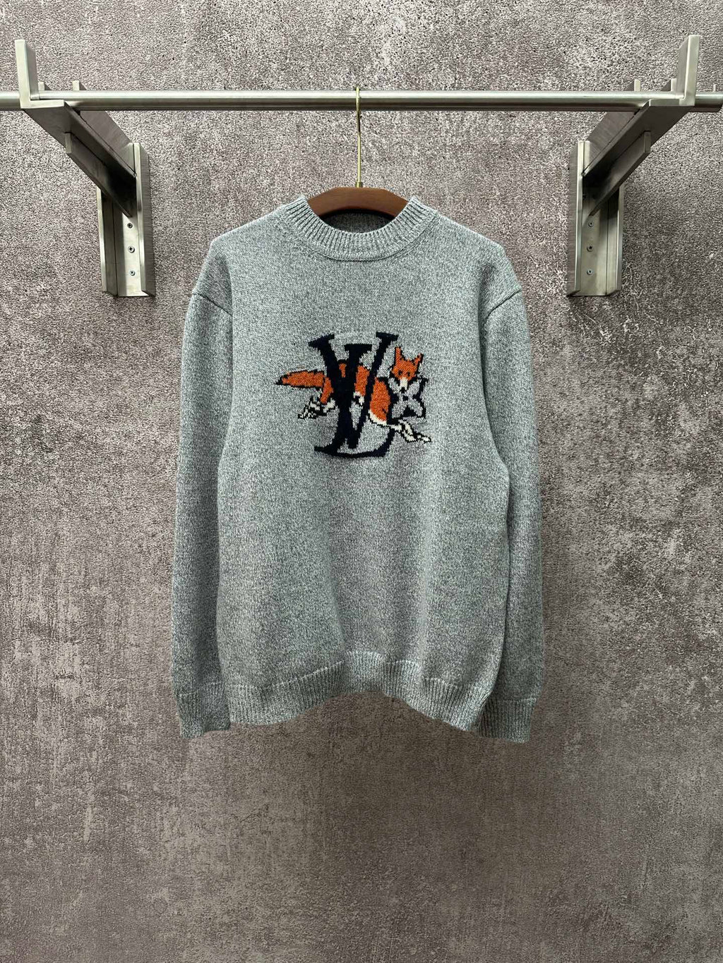 Louis Vuitton knit sweater in light blue with front logo graphic
