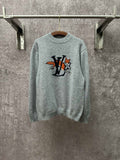 Louis Vuitton knit sweater in light blue with front logo graphic