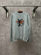 Louis Vuitton knit sweater in light blue with front logo graphic