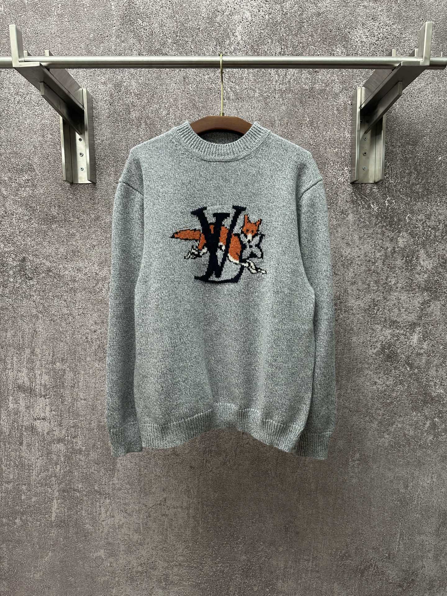 Louis Vuitton knit sweater in light blue with front logo graphic