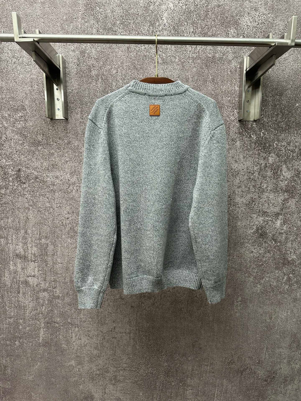 Louis Vuitton knit sweater long sleeves, back view, light blue, logo patch