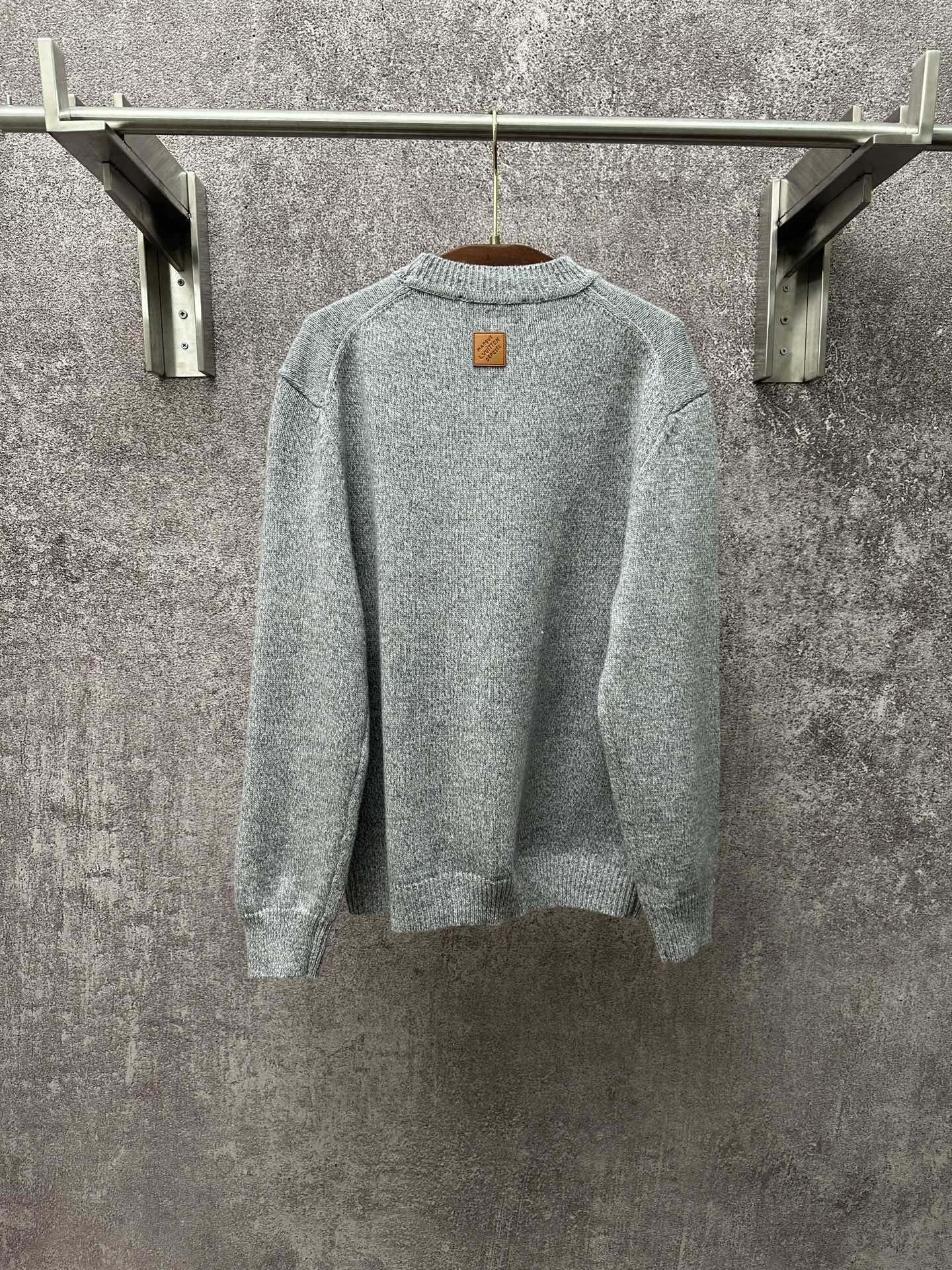 Louis Vuitton knit sweater long sleeves, back view, light blue, logo patch