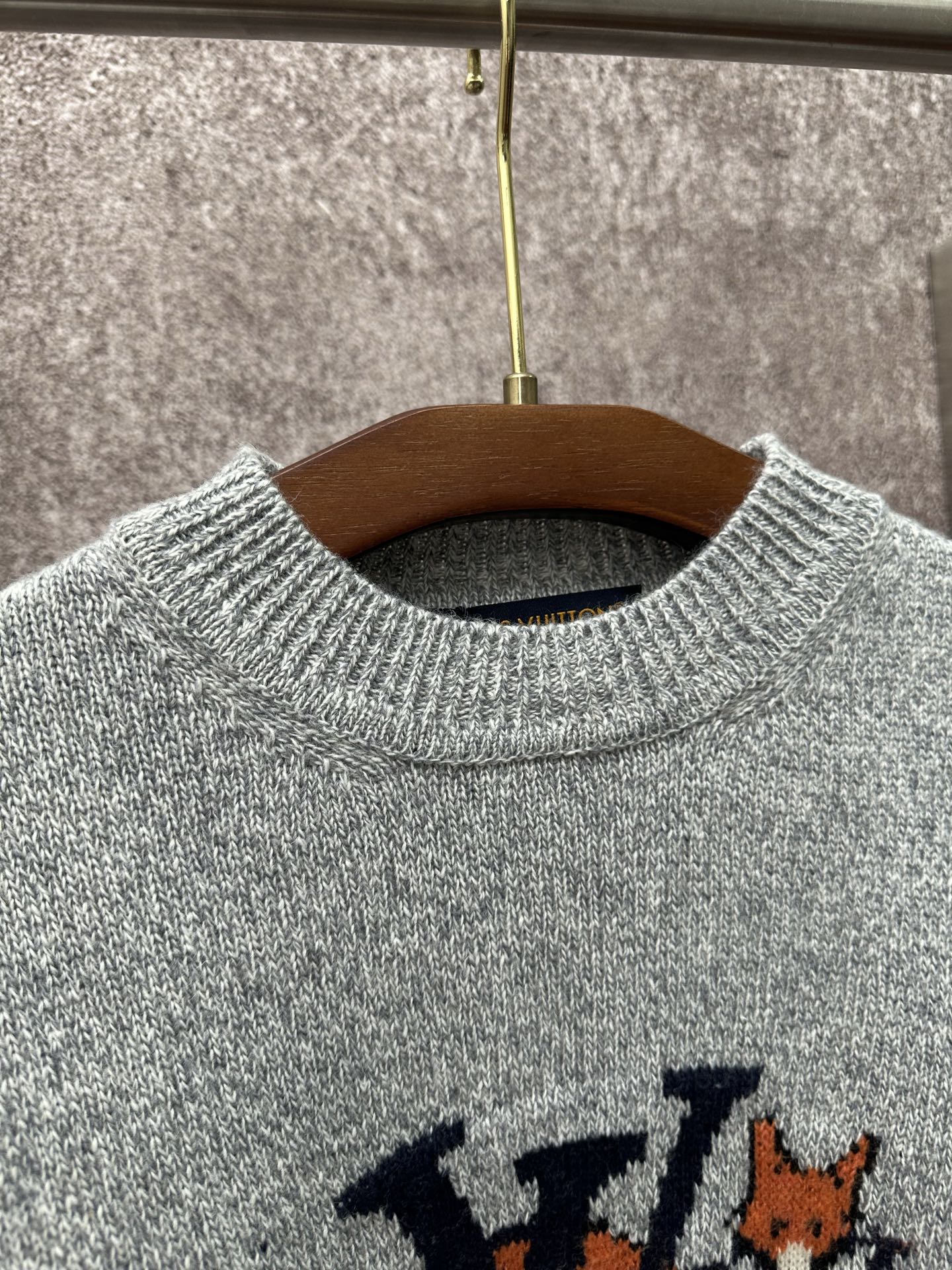 Louis Vuitton knit sweater neckline and logo detail in light blue