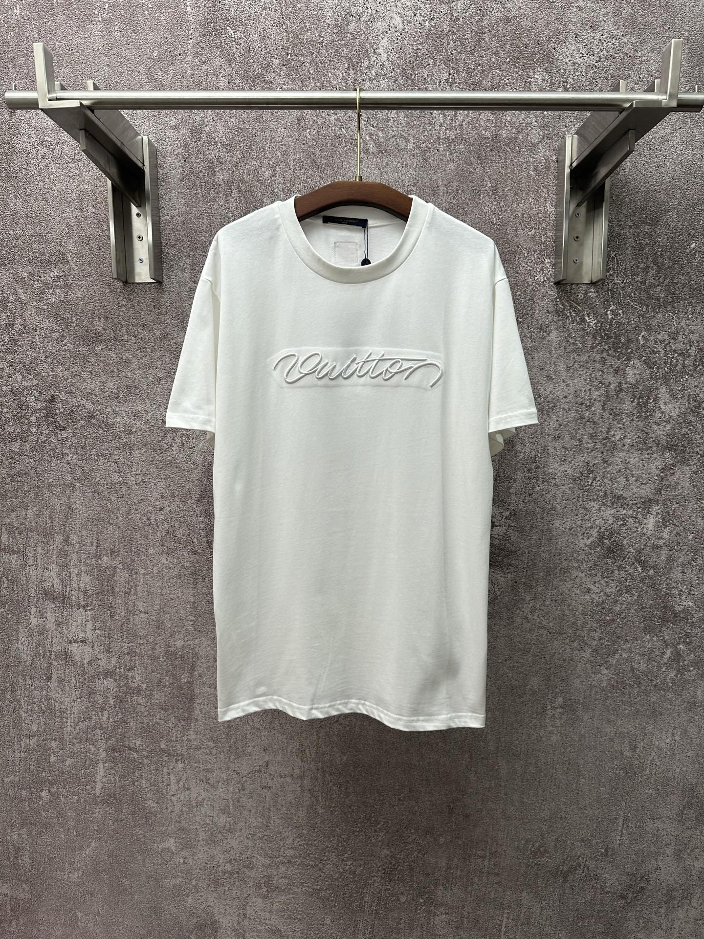 Louis Vuitton short-sleeve T-shirt in white with chest script logo