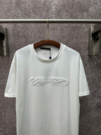 Louis Vuitton white short-sleeve T-shirt with centered chest script logo
