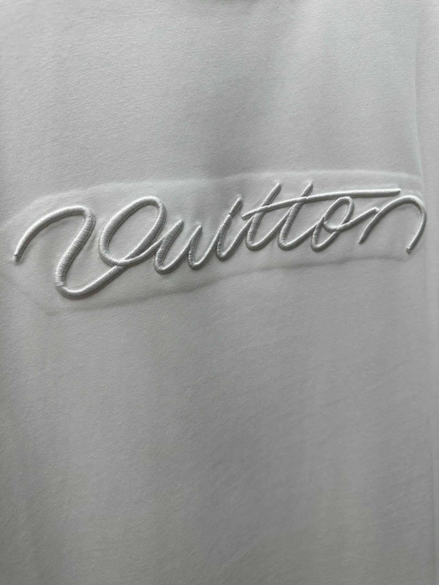 Louis Vuitton chest logo script on white T-shirt