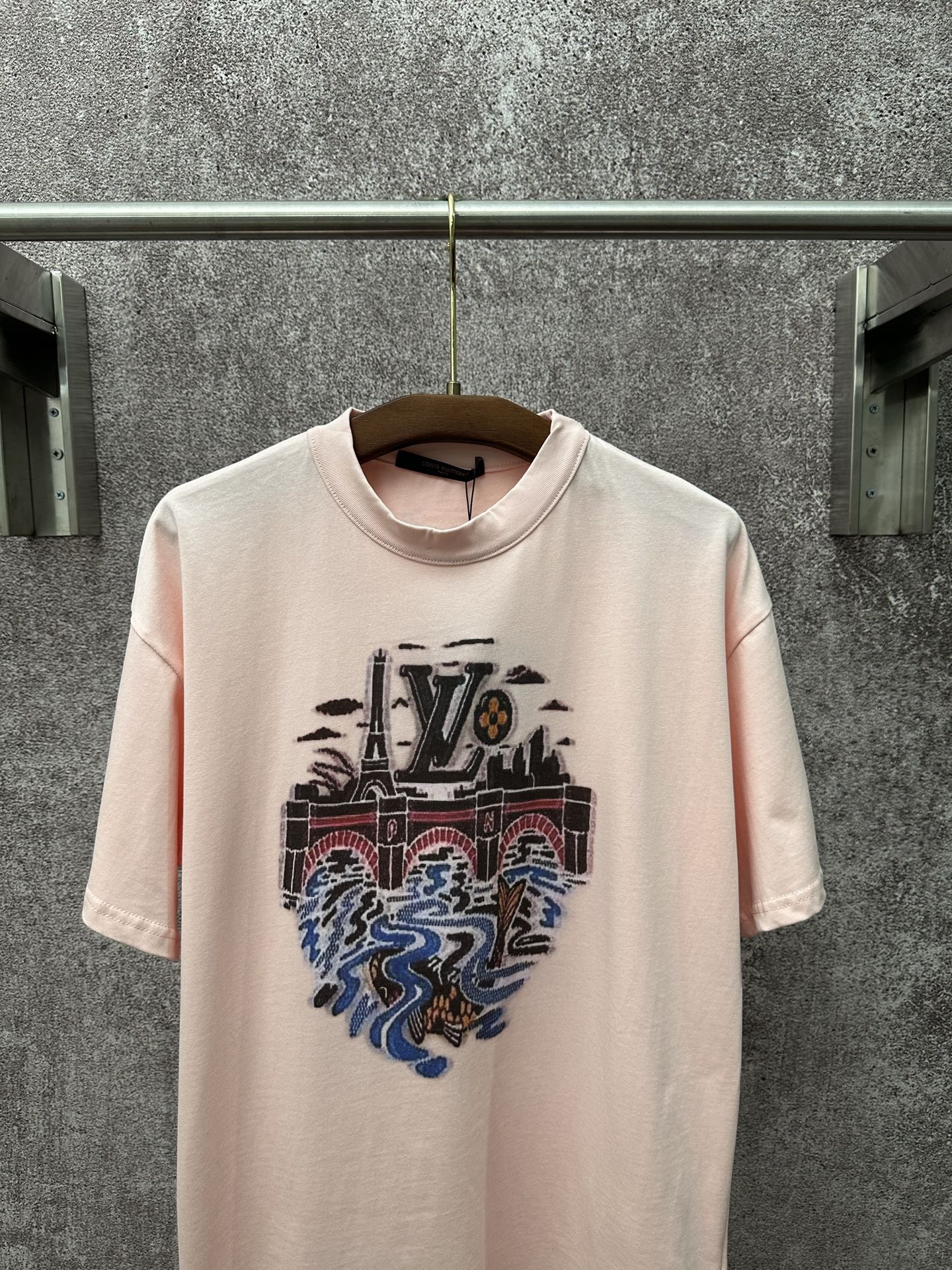 Louis Vuitton pale pink T-shirt with large LV graffiti-style graphic, crew neck