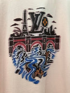 Louis Vuitton LV logo graphic on pale pink T-shirt with blue flame artwork