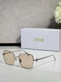 Dior sunglasses with silver-tone frame and light beige lenses