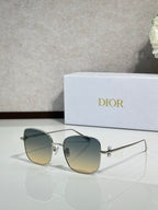 Dior sunglasses with silver-tone frame and dark gray lenses