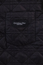 Black quilted jacket with Christian Dior Couture logo patch