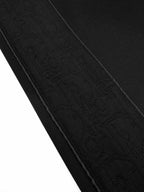 Black Dior pants woven texture with stitched seam line