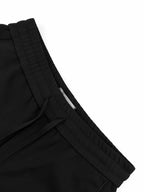 Black Dior pants waistband with gathered elastic and drawstring