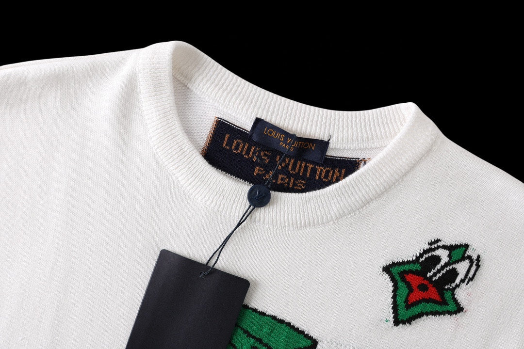 White crew-neck T-shirt close-up of collar ribbing and Louis Vuitton tag