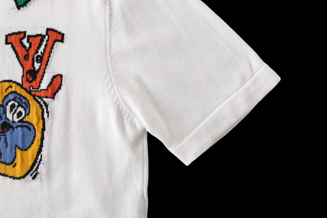 White T-shirt sleeve and side seam with partial graphic