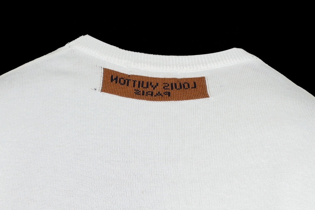 White crew-neck T-shirt close-up of back neck label