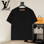 Black T-shirt back view with small brown neck label