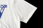 Louis Vuitton T-shirt side view, white short sleeve with blue graphic partially visible