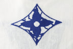 Louis Vuitton T-shirt detail, white fabric with blue diamond logo print