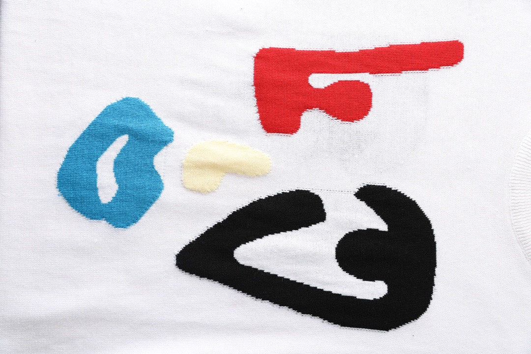 White T-shirt front graphic with red, blue, yellow, and black face shapes