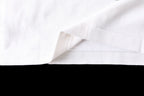 White T-shirt lower hem with clean stitched side seam