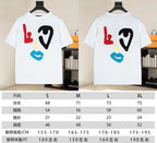 Two white graphic T-shirts on hangers, front print shown with size chart overlay