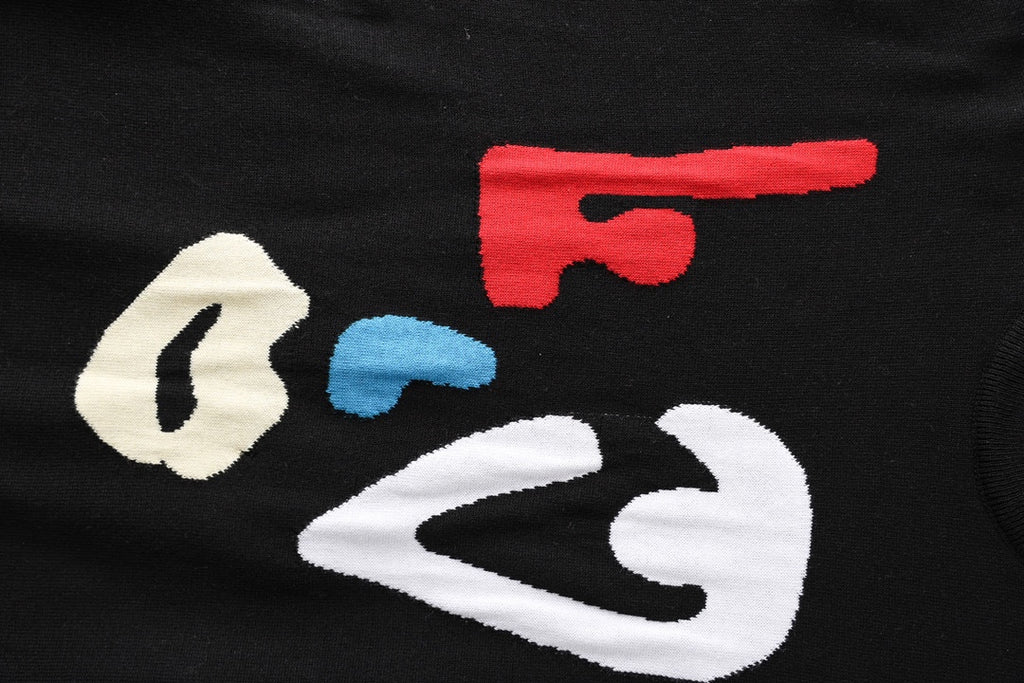 Black T-shirt with large multicolor face graphic, red, blue, and white details