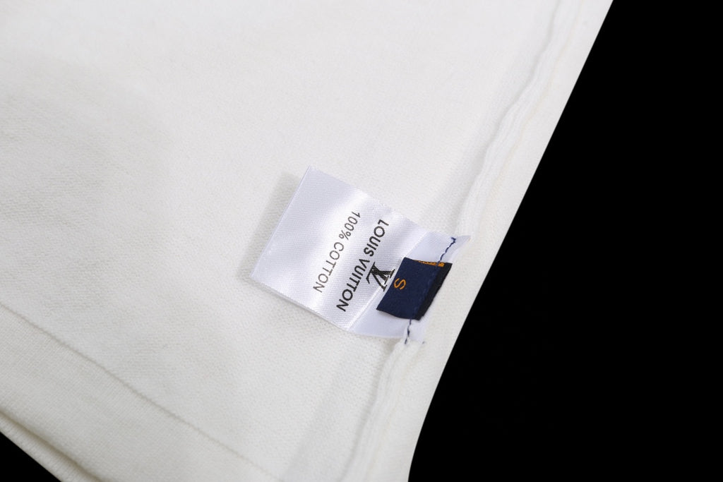 Louis Vuitton white T-shirt fabric label with blue print