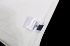 Louis Vuitton white T-shirt fabric label with blue print