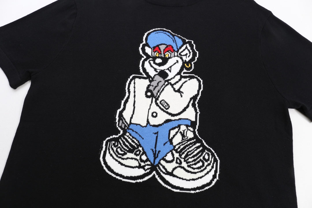 Black T-shirt with cartoon mascot sitting graphic on chest