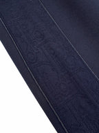 Navy textured woven fabric with visible side seam