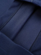 Navy interior pocket and seam stitching detail