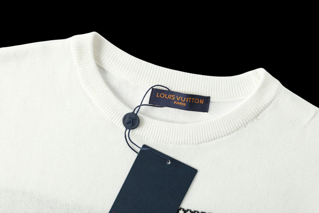 Light blue crewneck T-shirt collar with hanging Louis Vuitton price tag