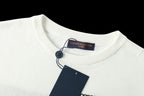 Light blue crewneck T-shirt collar with hanging Louis Vuitton price tag
