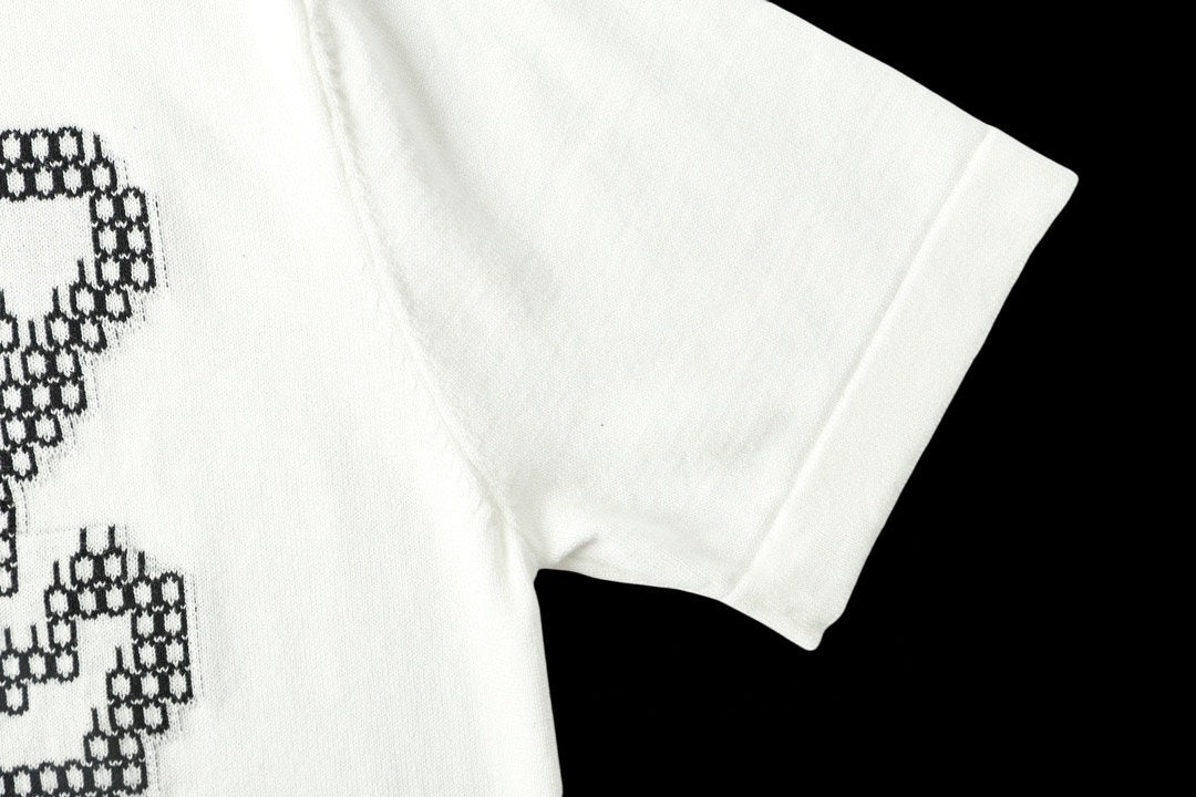 Light blue T-shirt sleeve and hem with partial black LV studded motif