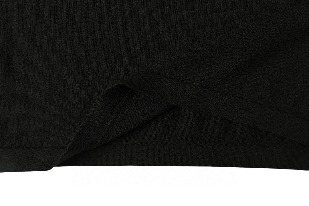 Black Louis Vuitton T-shirt fabric drape close-up